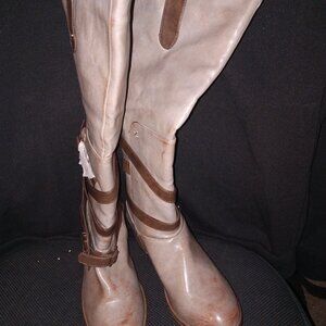 Tan boots with brown trim